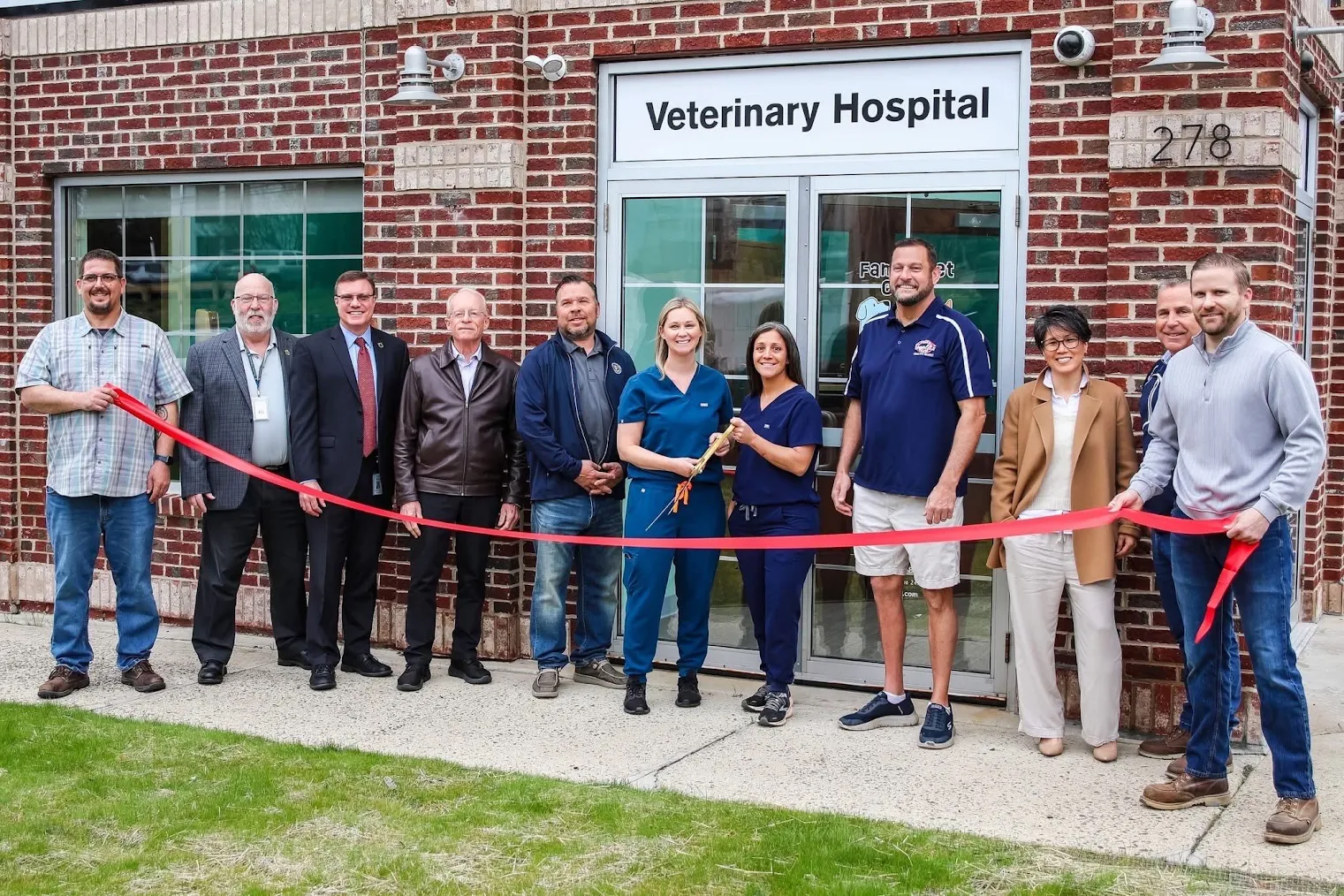 The JH Greene team standing with a veterinary staff on opening day of their new clinic.