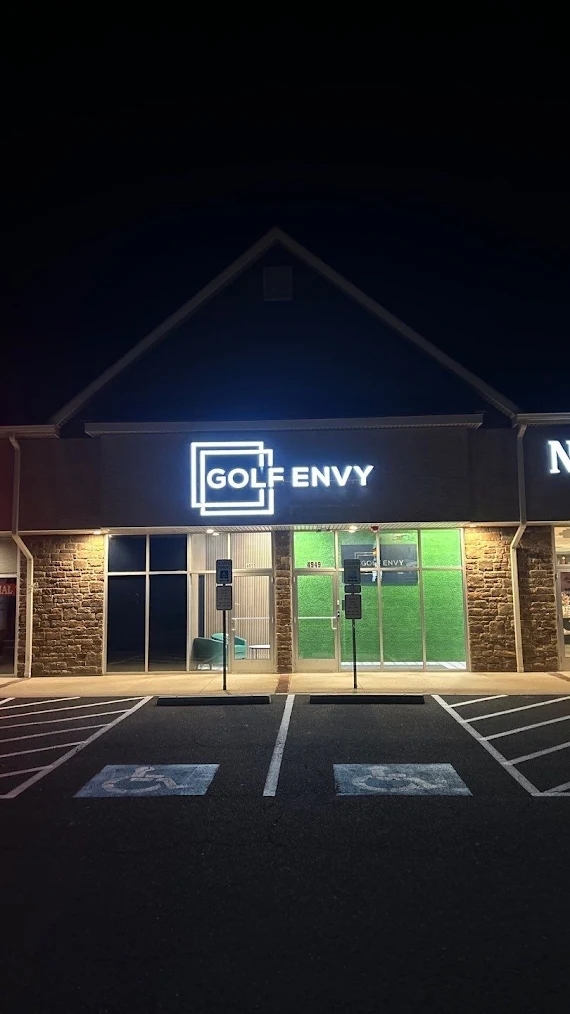 a golf envy store at night.